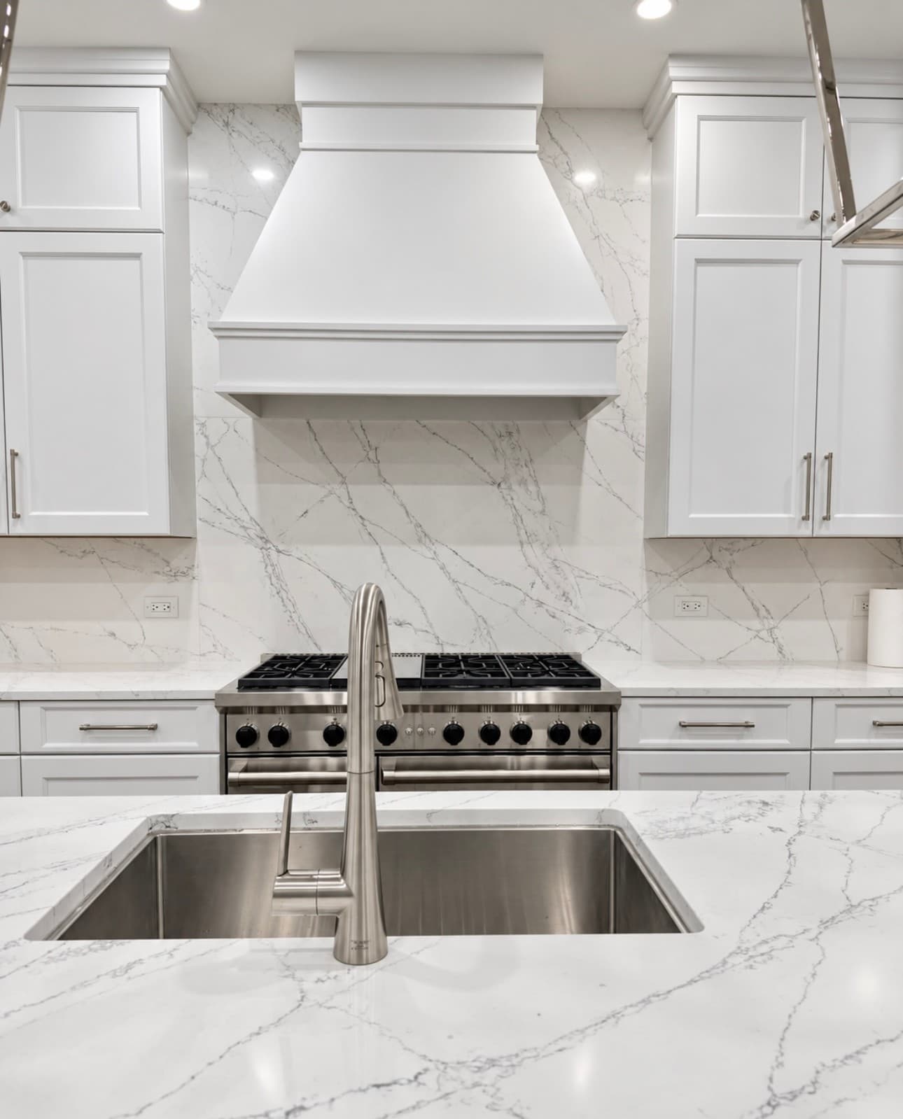 White Kitchen & Range Hood — Photo 1