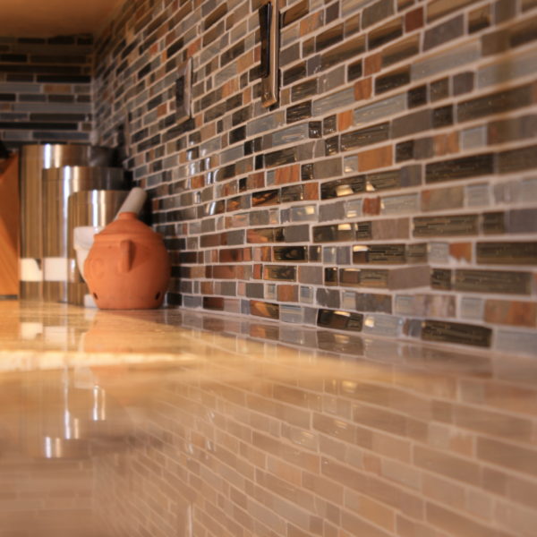 brown mosaic tile backsplash