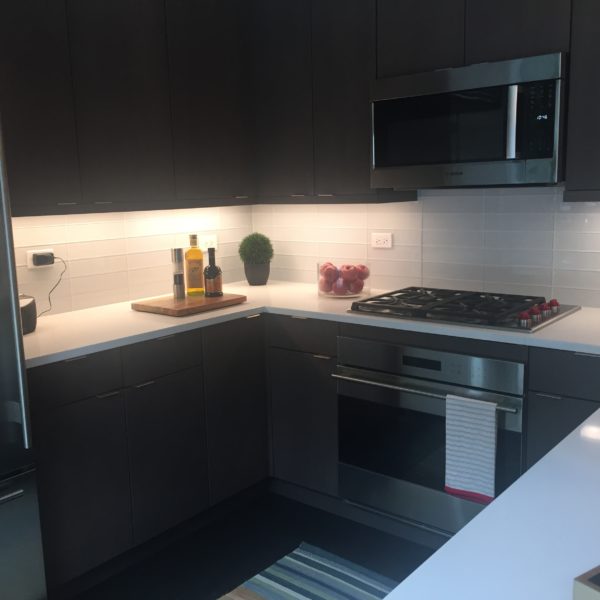dark-cabinet-kitchen-moasic-tiles