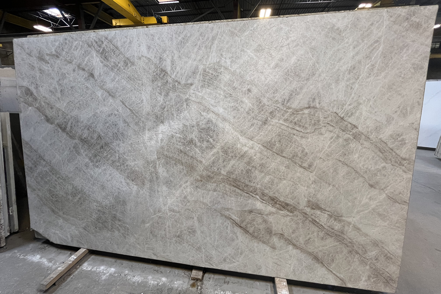 Illustration of elegant quartzite countertops in a modern kitchen
